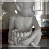 D29. White porcelain monkey stuatuette. 